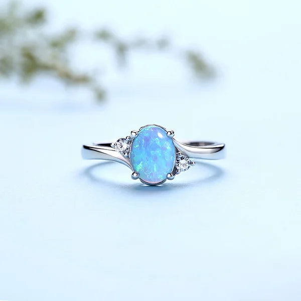 OPAL | Gegraveerde sterling zilveren blauwe ovale opaal ring