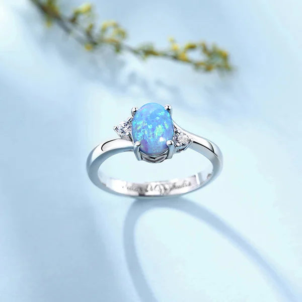 OPAL | Gegraveerde sterling zilveren blauwe ovale opaal ring